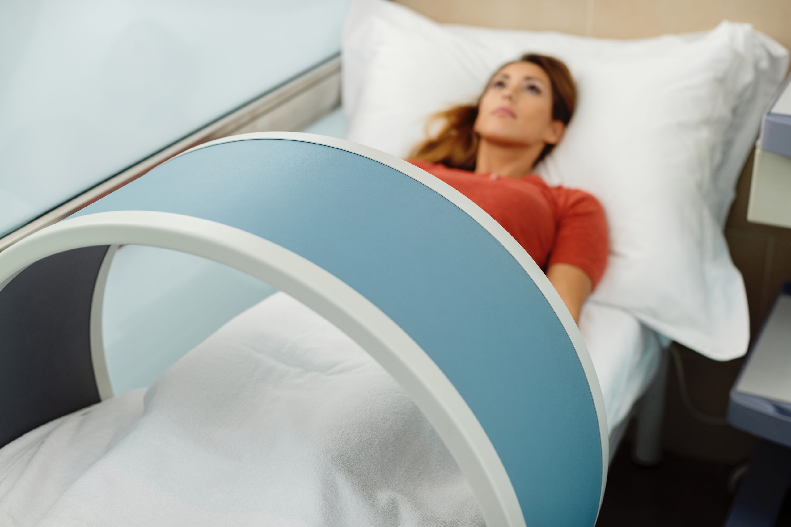 Close-up of woman having magnetotherapy at medical clinic.